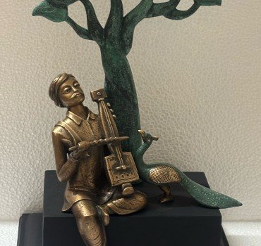 Musician with Tree & Pecock   